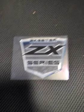 91171510 Skeeter 12347 New Authentic Emblem Zx Series Black/ Chrome 4 Inch -91171510
