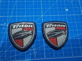 8104261 Triton 2 Raised Boat Decal Sticker Shield Hard Plastic 3/4 X 3 Inches Chrome
