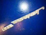 0314771 Emblem Johnson Evinrude 55HP Used. Price: $25.00.